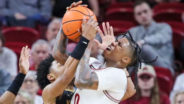 Razorbacks Khalif Battle battles inside for the ball against Vanderbilt